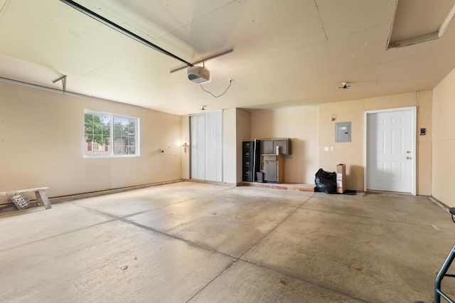 3204 49th St NW, Rochester, MN 55901 - garage featuring a garage door opener and electric panel