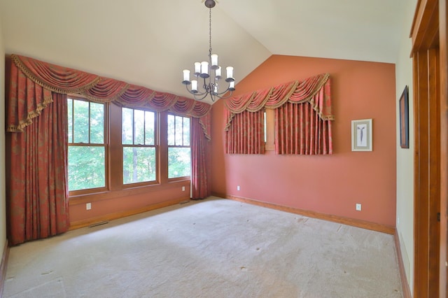 2471 Birch Forest Rd SW, Nisswa, MN 56468 - unfurnished room with vaulted ceiling, a chandelier, and carpet floors