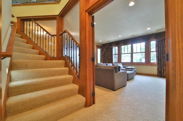 2471 Birch Forest Rd SW, Nisswa, MN 56468 - stairway featuring carpet floors and recessed lighting