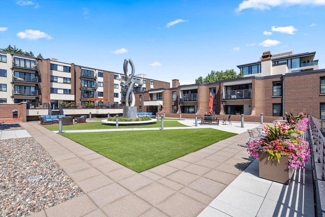 48 Groveland Ter Unit B301, Minneapolis, MN 55403 - surrounding community featuring a yard, outdoor lounge area, and a residential view