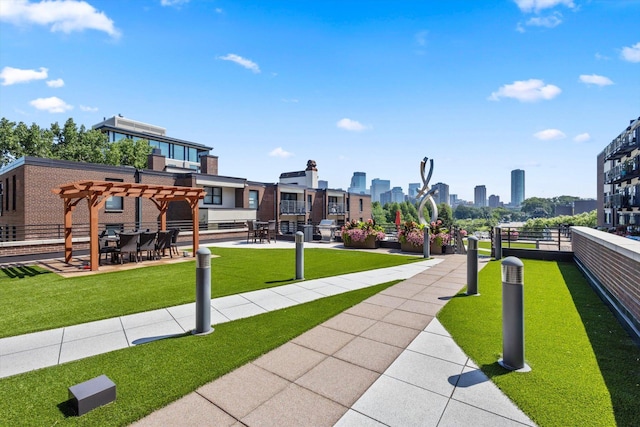 48 Groveland Ter Unit B301, Minneapolis, MN 55403 - view of community featuring a pergola and a view of skyline