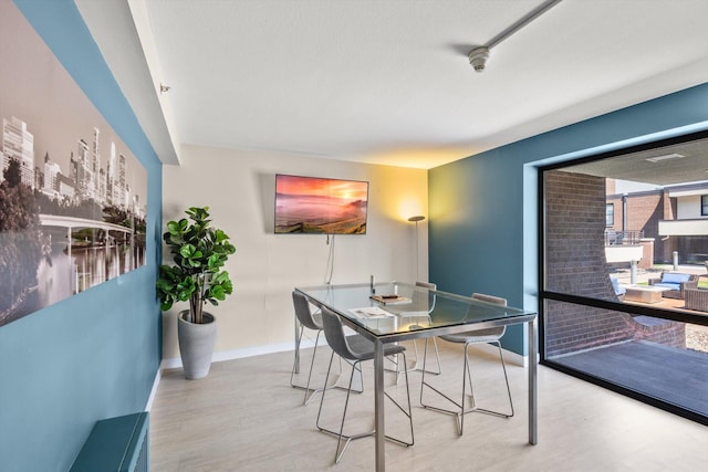 48 Groveland Ter Unit B301, Minneapolis, MN 55403 - dining area featuring wood finished floors