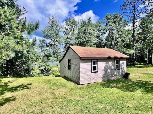 8931 Palm Rd, Britt, MN 55710 - view of property exterior featuring a lawn
