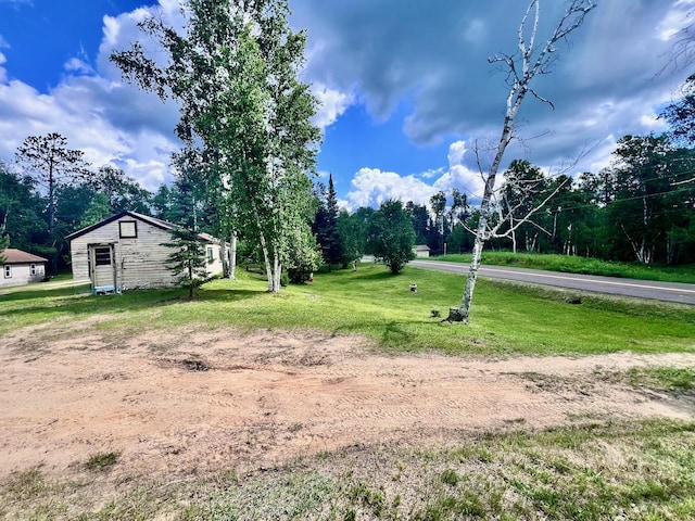 8931 Palm Rd, Britt, MN 55710 - view of green lawn featuring view of scattered trees