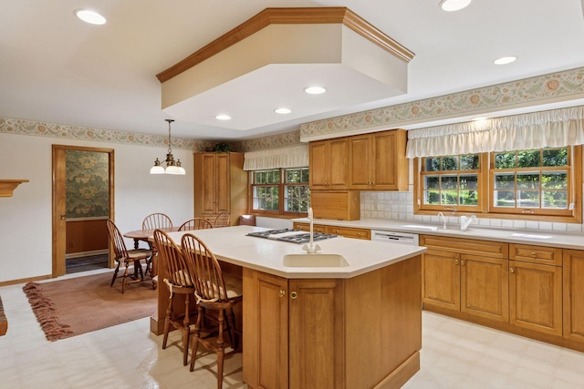 33 Eagle Ridge Rd, North Oaks, MN 55127 - kitchen with gas stovetop, light floors, brown cabinets, light countertops, and recessed lighting