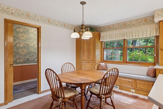 33 Eagle Ridge Rd, North Oaks, MN 55127 - dining room featuring a chandelier and light tile patterned floors