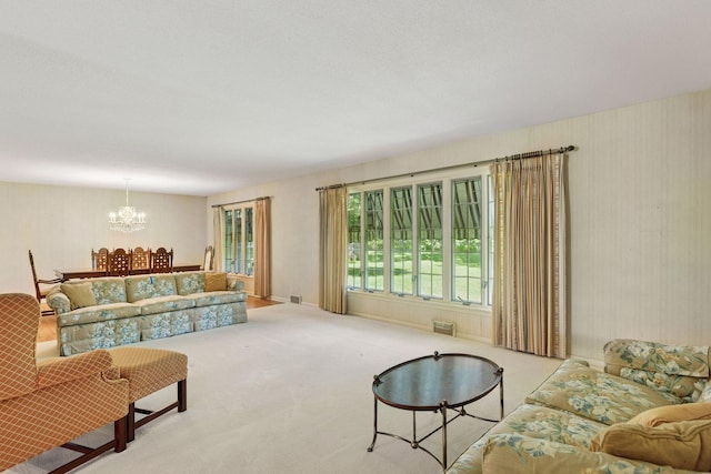 33 Eagle Ridge Rd, North Oaks, MN 55127 - living room featuring a chandelier and carpet floors