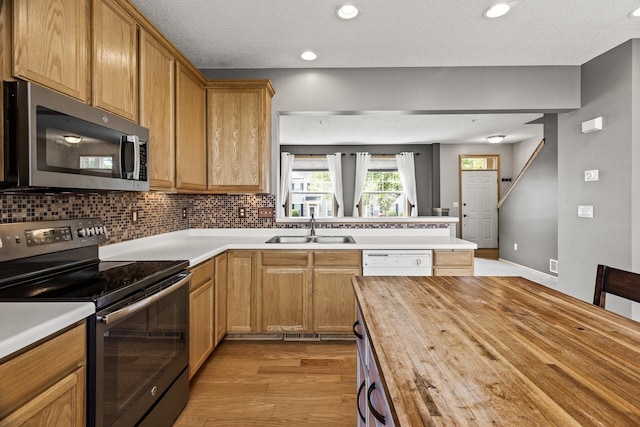 2079 Clover Ridge Dr, Chaska, MN 55318 - kitchen featuring stainless steel microwave, electric stove, wooden counters, dishwasher, and light wood-type flooring