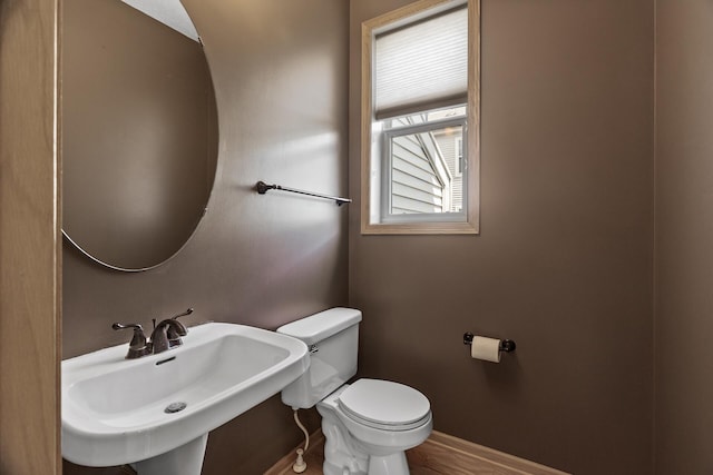 2079 Clover Ridge Dr, Chaska, MN 55318 - half bath featuring a sink and toilet