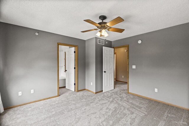 2079 Clover Ridge Dr, Chaska, MN 55318 - unfurnished bedroom with carpet, a textured ceiling, and ceiling fan