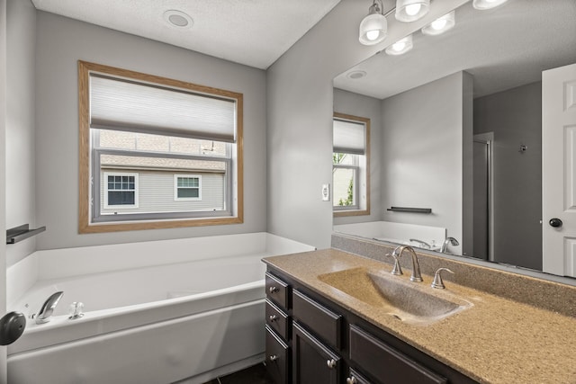 2079 Clover Ridge Dr, Chaska, MN 55318 - full bath with a bath, vanity, and a textured ceiling