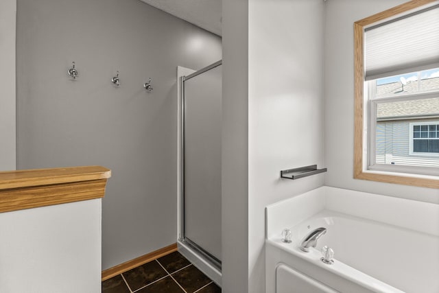 2079 Clover Ridge Dr, Chaska, MN 55318 - full bath with a stall shower, a bath, and tile patterned floors
