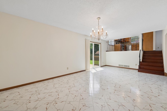 629 73rd Way N, Brooklyn Park, MN 55444 - unfurnished living room featuring a chandelier, stairway, marble finish floors, and a textured ceiling