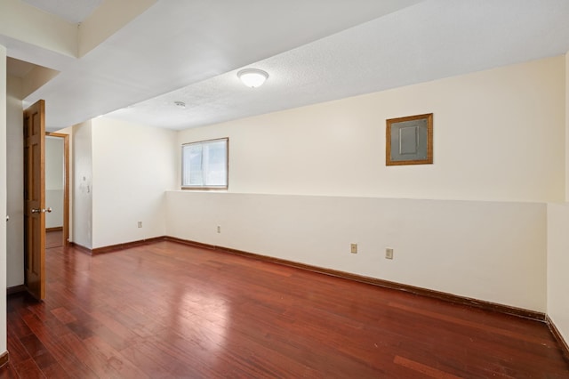 629 73rd Way N, Brooklyn Park, MN 55444 - basement featuring wood-type flooring and baseboards