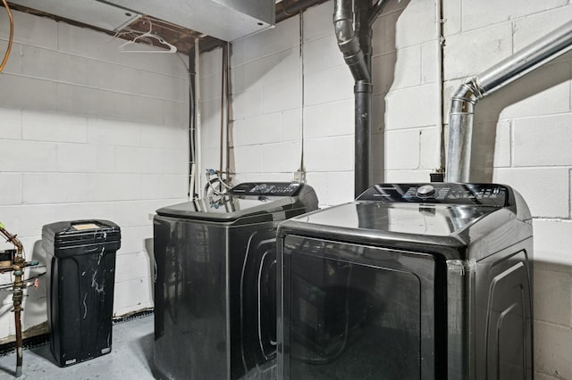 629 73rd Way N, Brooklyn Park, MN 55444 - washroom featuring washing machine and clothes dryer and concrete block wall
