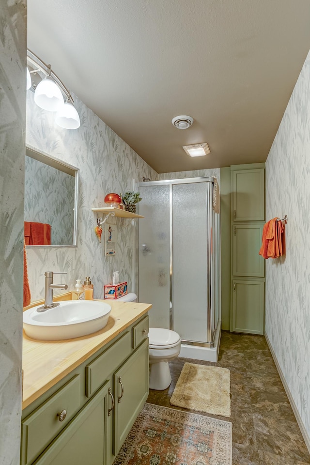W1162 Aspen Dr, Spring Valley, WI 54767 - bathroom featuring wallpapered walls, vanity, and a stall shower