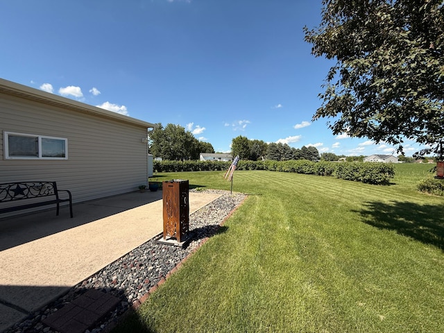 151 Skyline Dr, Granite Falls, MN 56241 - view of grassy yard with a patio area