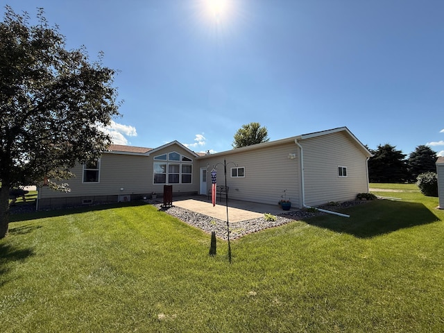 151 Skyline Dr, Granite Falls, MN 56241 - back of house with a lawn and a patio area