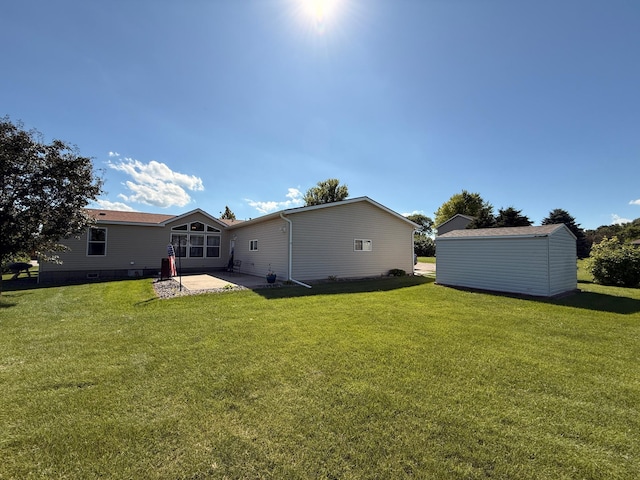 151 Skyline Dr, Granite Falls, MN 56241 - back of house with a patio, a yard, and a shed