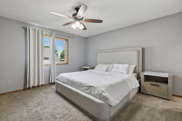 4478 150th St, Savage, MN 55378 - bedroom featuring light colored carpet, a textured ceiling, and a ceiling fan