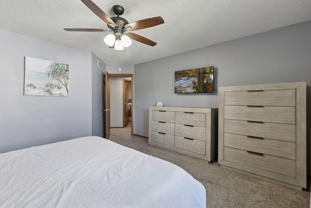 4478 150th St, Savage, MN 55378 - bedroom featuring light carpet, ceiling fan, and a textured ceiling