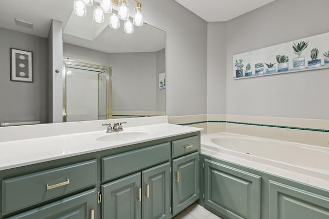 4478 150th St, Savage, MN 55378 - full bathroom featuring vanity, a bath, and a stall shower