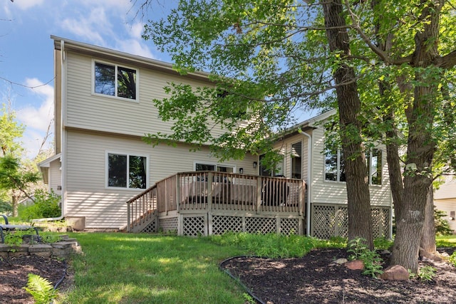 4478 150th St, Savage, MN 55378 - rear view of house featuring a deck, a lawn, and stairs