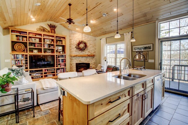 16735 Downey Dr, Park Rapids, MN 56470 - kitchen with wooden ceiling, open floor plan, vaulted ceiling, an island with sink, and decorative light fixtures