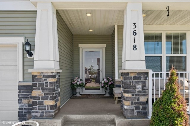 3618 112th Cir NE, Blaine, MN 55449 - property entrance with covered porch and stone siding