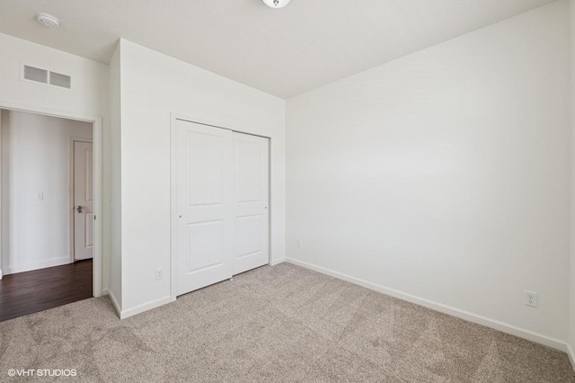 3618 112th Cir NE, Blaine, MN 55449 - unfurnished bedroom featuring carpet and a closet