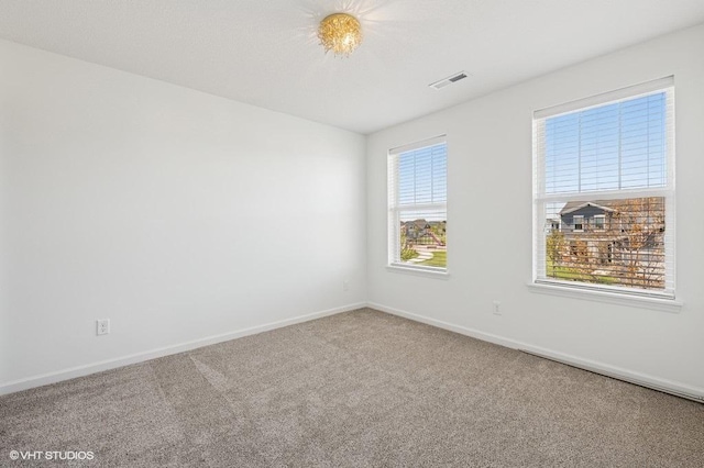 3618 112th Cir NE, Blaine, MN 55449 - spare room featuring carpet and baseboards