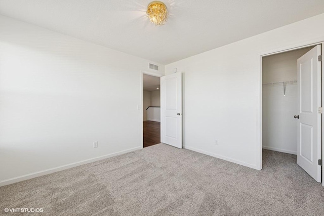 3618 112th Cir NE, Blaine, MN 55449 - unfurnished bedroom featuring carpet, a closet, and a spacious closet