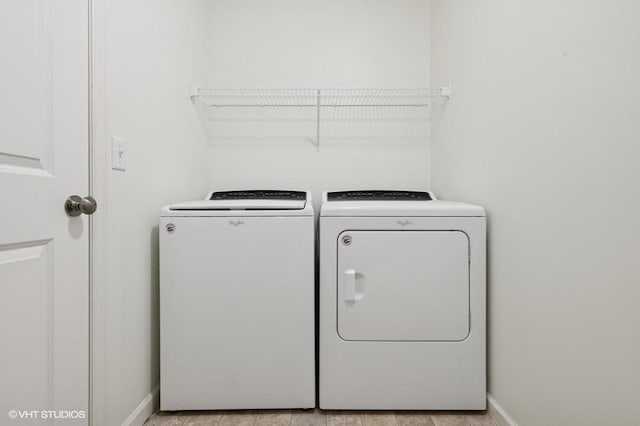 3618 112th Cir NE, Blaine, MN 55449 - laundry room with washing machine and clothes dryer and baseboards