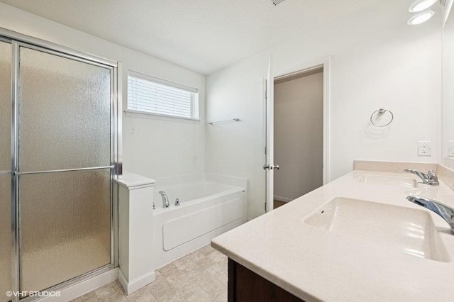 3618 112th Cir NE, Blaine, MN 55449 - full bathroom featuring double vanity, a garden tub, and a stall shower