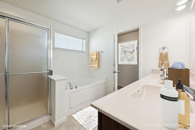 3618 112th Cir NE, Blaine, MN 55449 - bathroom with a garden tub, vanity, a stall shower, and tile patterned flooring