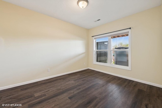 3618 112th Cir NE, Blaine, MN 55449 - unfurnished room with dark wood-style floors