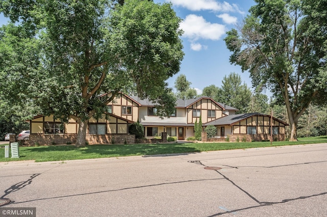 1111 Royal Oaks Dr, Shoreview, MN 55126 - english style home featuring a front lawn