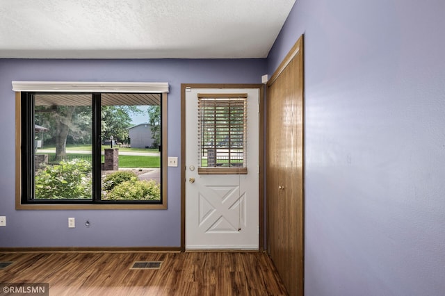 1111 Royal Oaks Dr, Shoreview, MN 55126 - entryway with wood finished floors