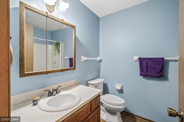 1111 Royal Oaks Dr, Shoreview, MN 55126 - bathroom featuring vanity, a shower with shower curtain, and wood finished floors