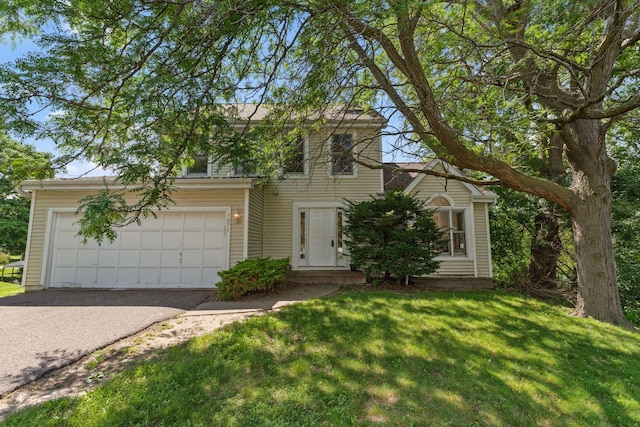 5071 Arrowood Ln N, Plymouth, MN 55442 - view of front facade with asphalt driveway and a front lawn