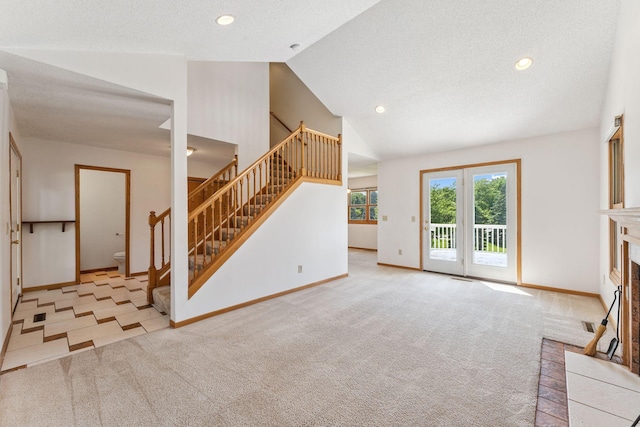 5071 Arrowood Ln N, Plymouth, MN 55442 - unfurnished living room with stairs, carpet floors, a fireplace, vaulted ceiling, and recessed lighting