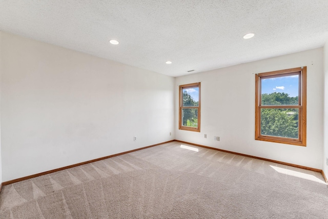 5071 Arrowood Ln N, Plymouth, MN 55442 - unfurnished room featuring carpet flooring, recessed lighting, and a textured ceiling