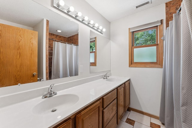 5071 Arrowood Ln N, Plymouth, MN 55442 - full bathroom featuring double vanity, tile patterned flooring, and curtained shower