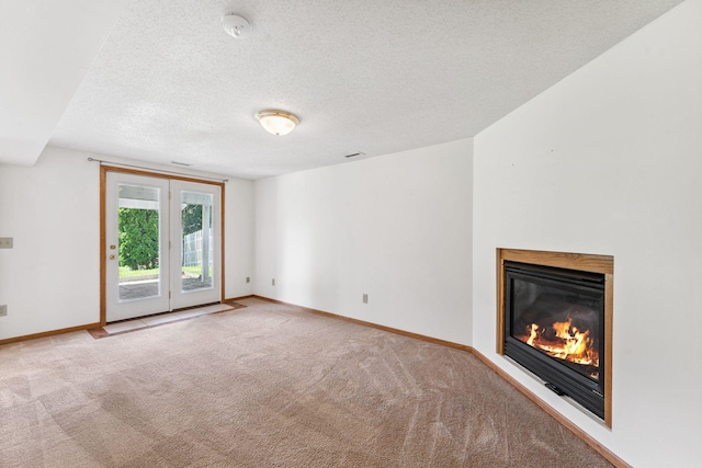 5071 Arrowood Ln N, Plymouth, MN 55442 - unfurnished living room with carpet flooring, a glass covered fireplace, and a textured ceiling