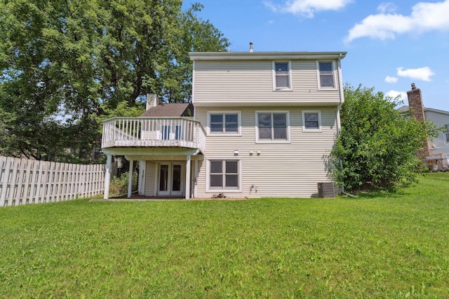 5071 Arrowood Ln N, Plymouth, MN 55442 - rear view of property featuring a wooden deck and french doors