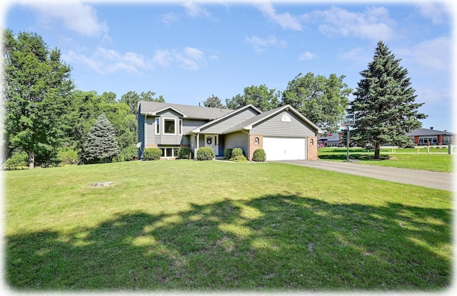 7111 Trenton Ln N, Maple Grove, MN 55369 - tri-level home with driveway, a garage, and a front yard