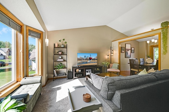 7111 Trenton Ln N, Maple Grove, MN 55369 - carpeted living room with lofted ceiling and a chandelier