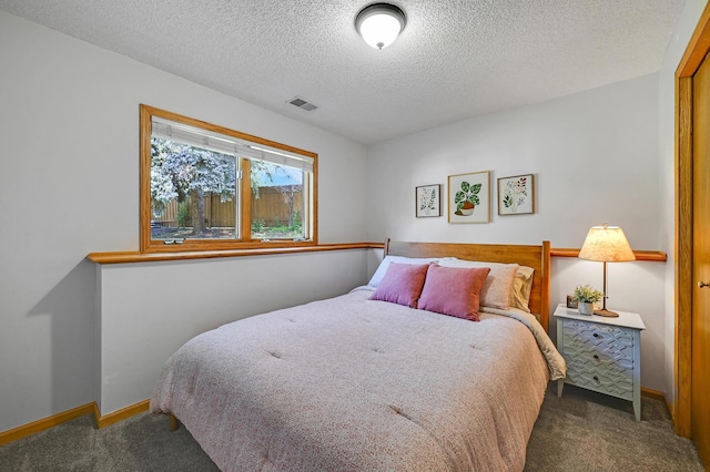 7111 Trenton Ln N, Maple Grove, MN 55369 - bedroom featuring carpet floors and a textured ceiling