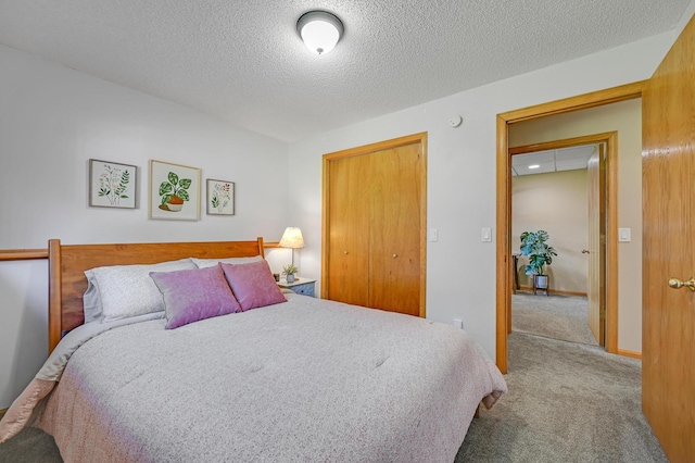7111 Trenton Ln N, Maple Grove, MN 55369 - carpeted bedroom featuring a textured ceiling and a closet