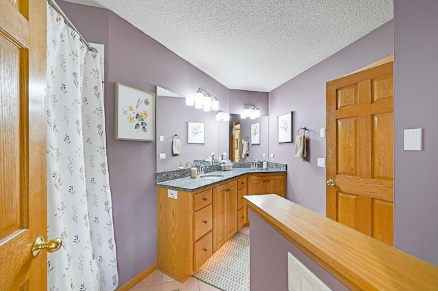 7111 Trenton Ln N, Maple Grove, MN 55369 - full bath featuring double vanity, tile patterned floors, a textured ceiling, and curtained shower